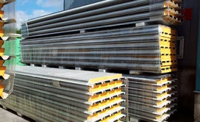 Sandwich panels in front of warehouse